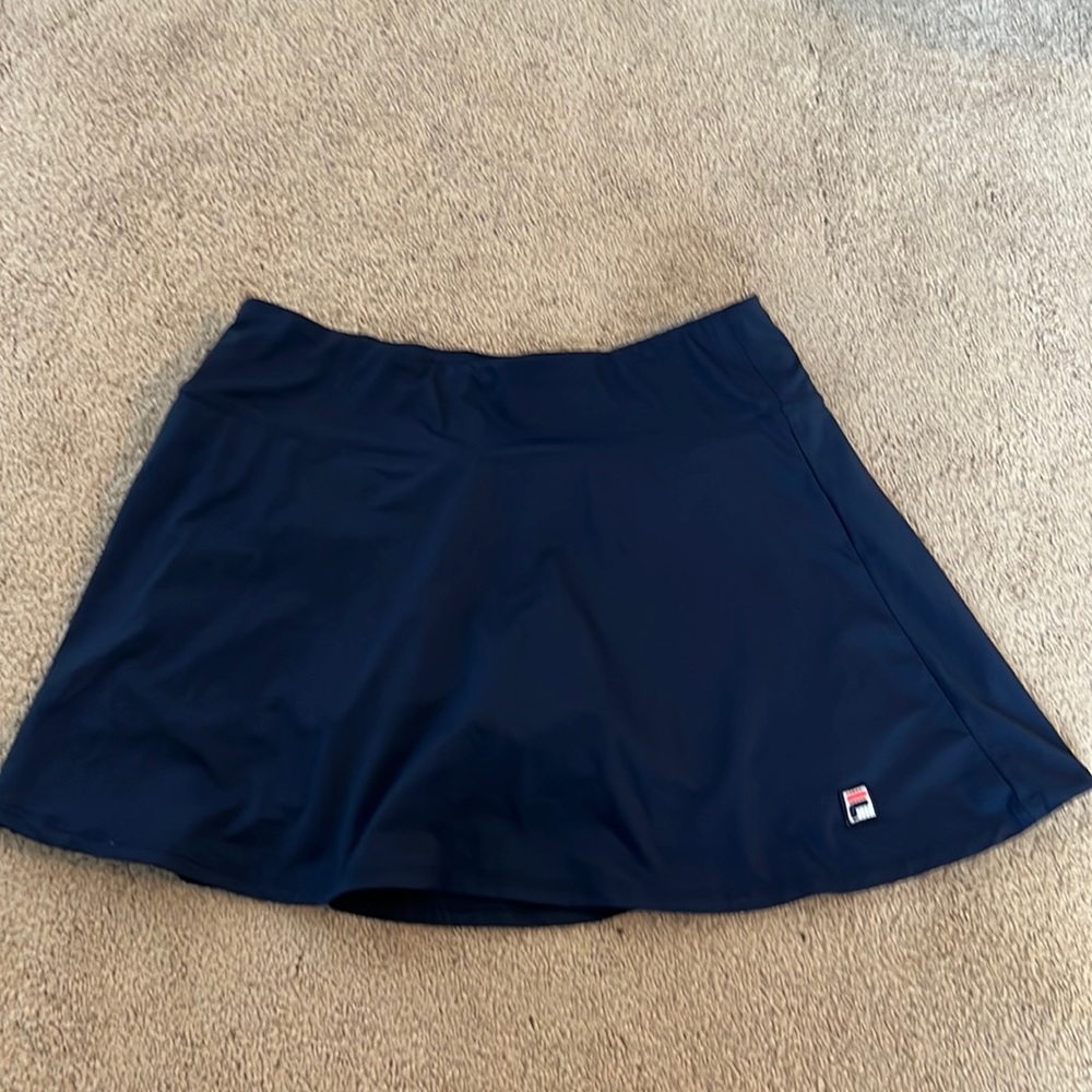 Atheistic tennis skirt with built in shorts